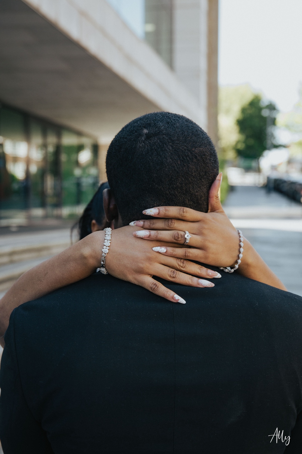 Mercy and Ifeoluwa embracing